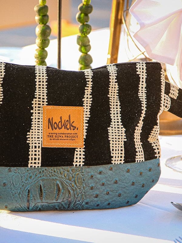 African Monarch Lodges Sijwa Boutique Nockels Bag