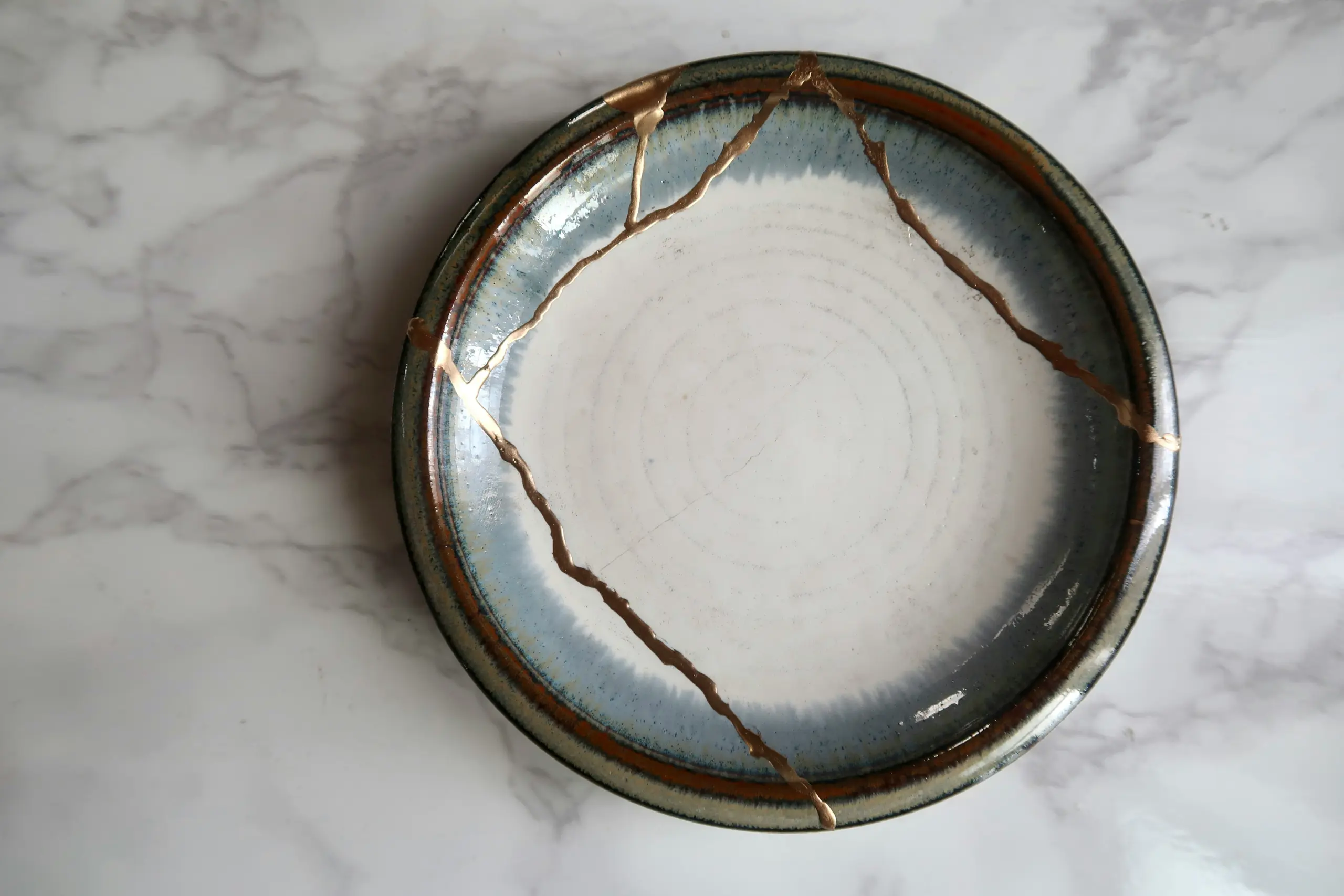 Kintsugi mended ceramic vessel
